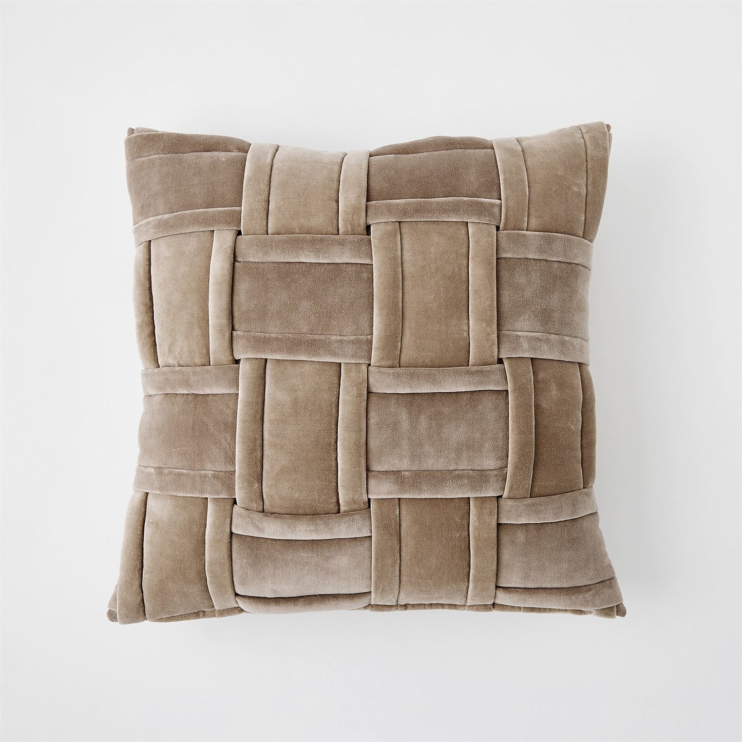 Brown woven pillow on a white background