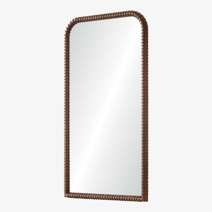 Rectangular mirror with a brown wicker frame on a white background