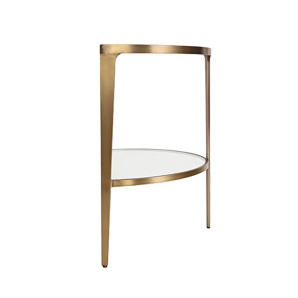 Small round table with gold metal frame and white glass top on a white background