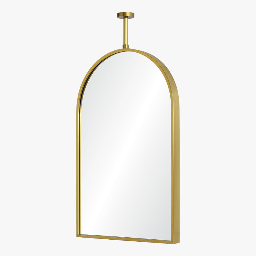 Gold-framed arch mirror on a white background