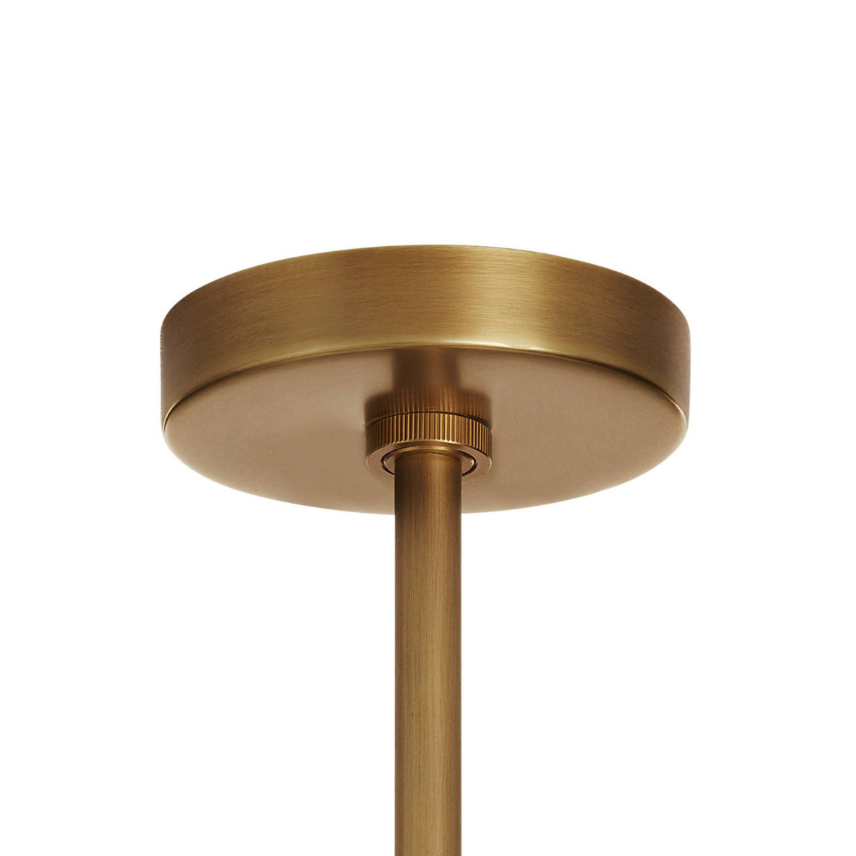 Brass ceiling light fixture on a white background