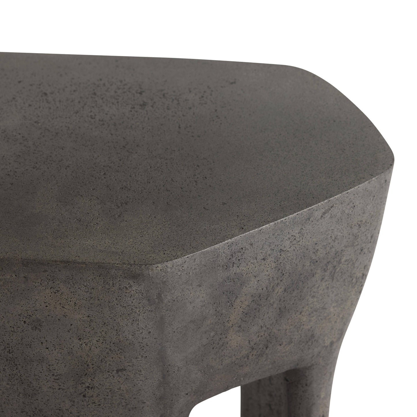 Concrete stool with a textured surface on a white background