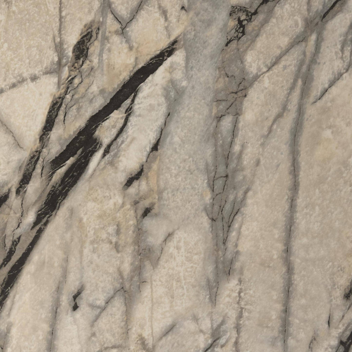 Close-up of a marble-like stone surface with gray and beige tones.
