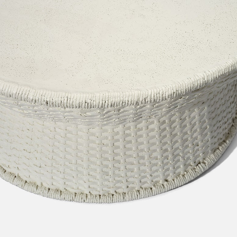 White textured coffee table on a light gray background