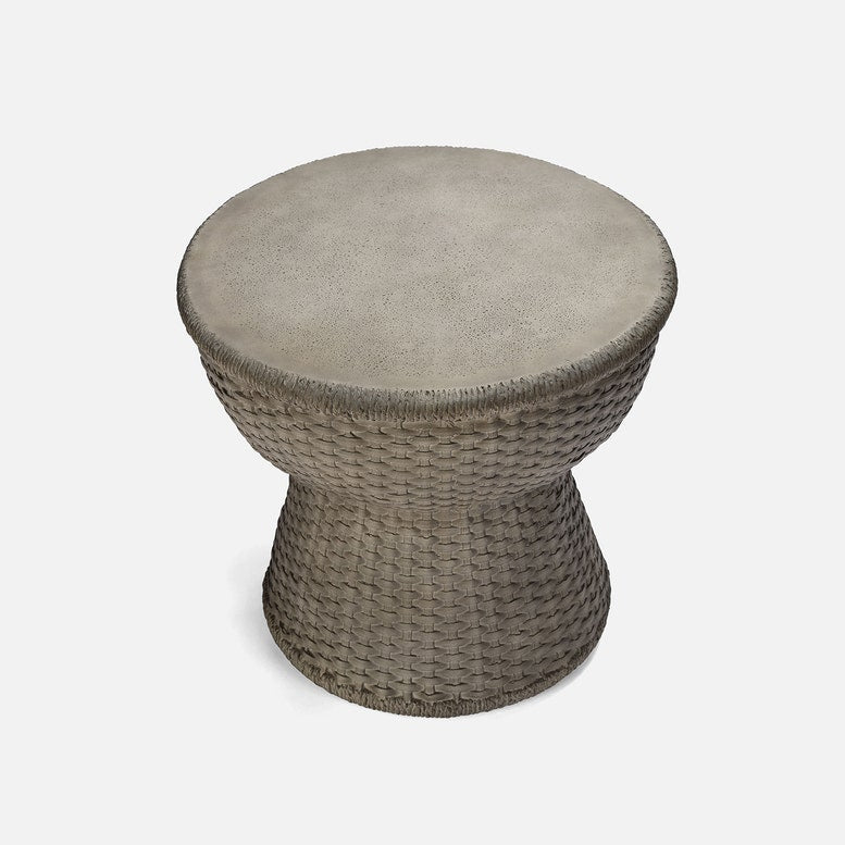 Round woven stool on a white background