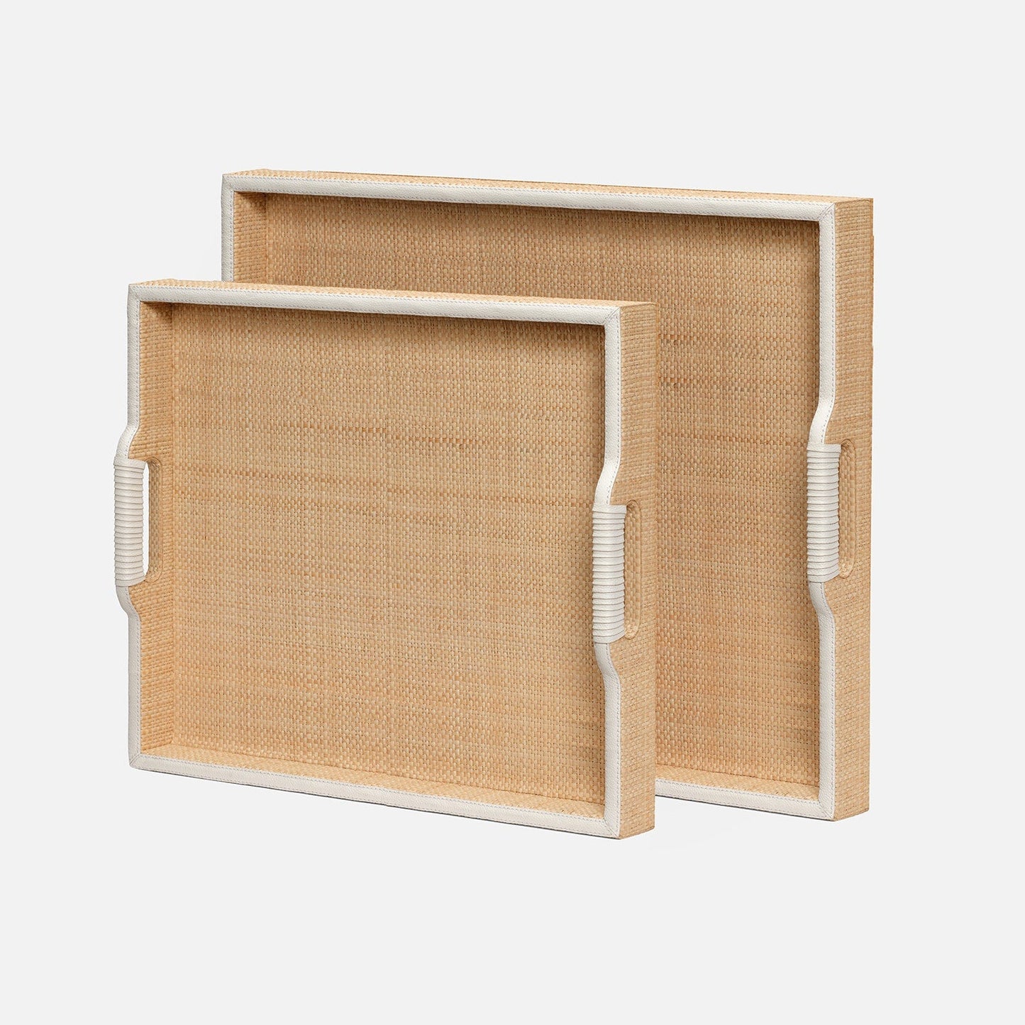 Two woven trays with white frames on a light gray background