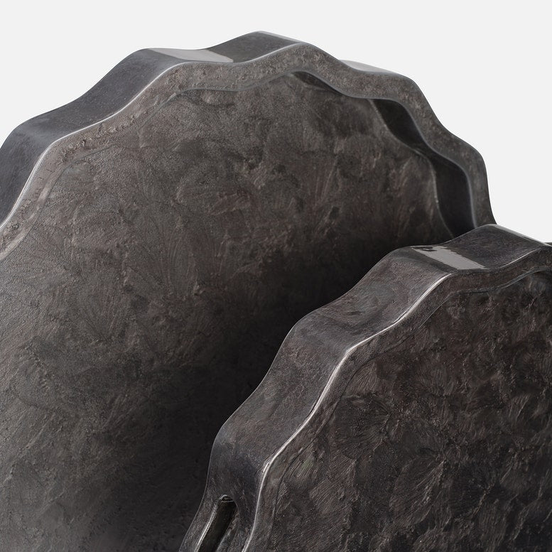 Two dark round gray trays top