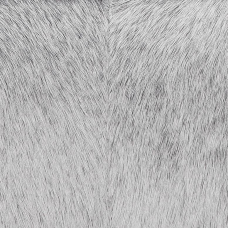 A close-up of a light gray faux fur or sheepskin material with visible hair texture and a central seam running vertically.