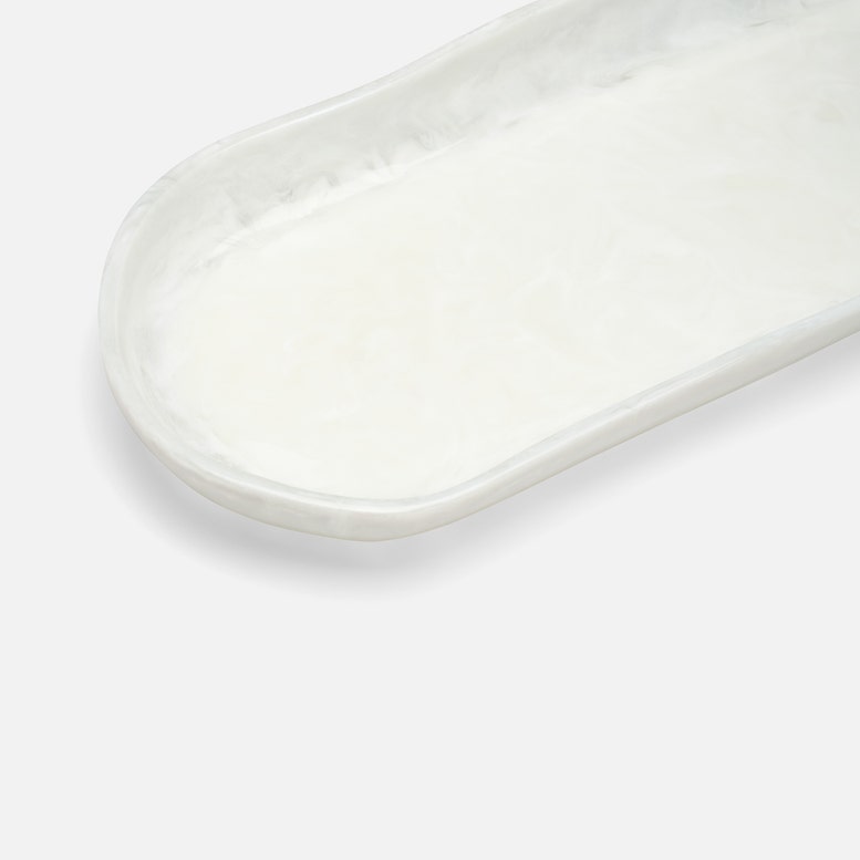 White ceramic tray on a light gray background