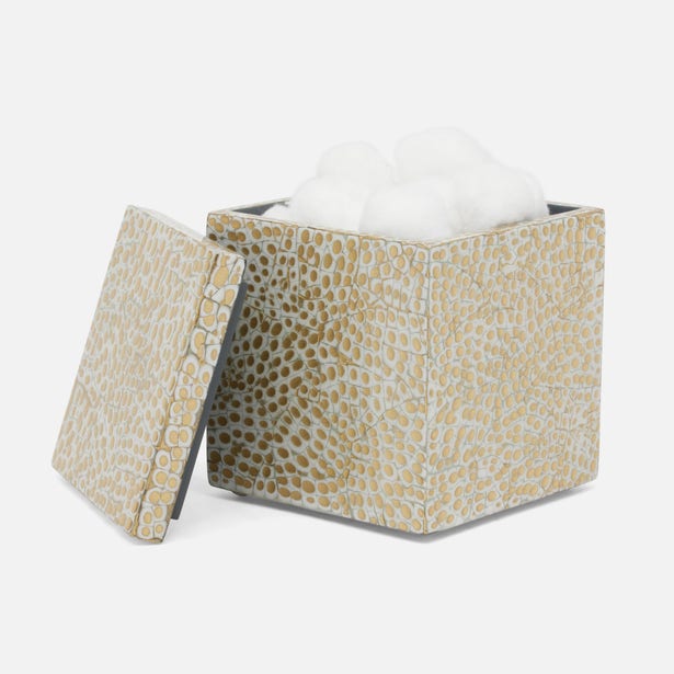 canister with a patterned cover on a white background