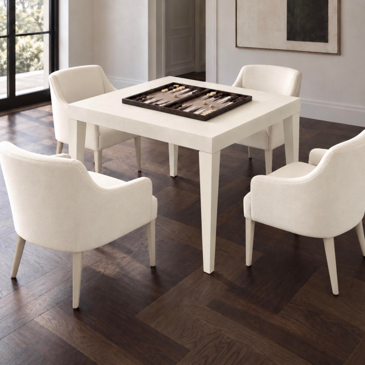 game table in the center of dining chairs