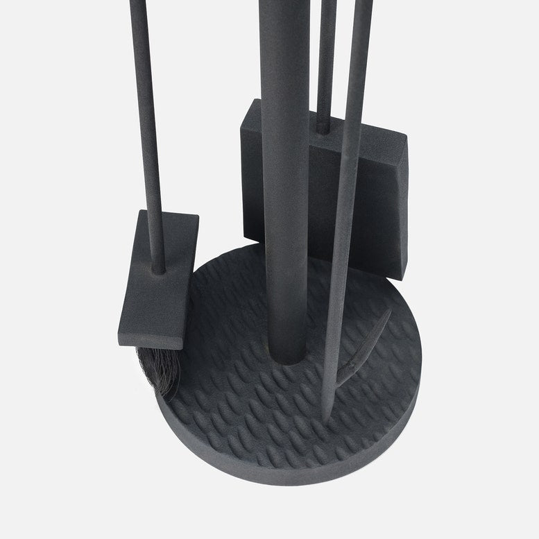 Black cleaning tool set on a white background