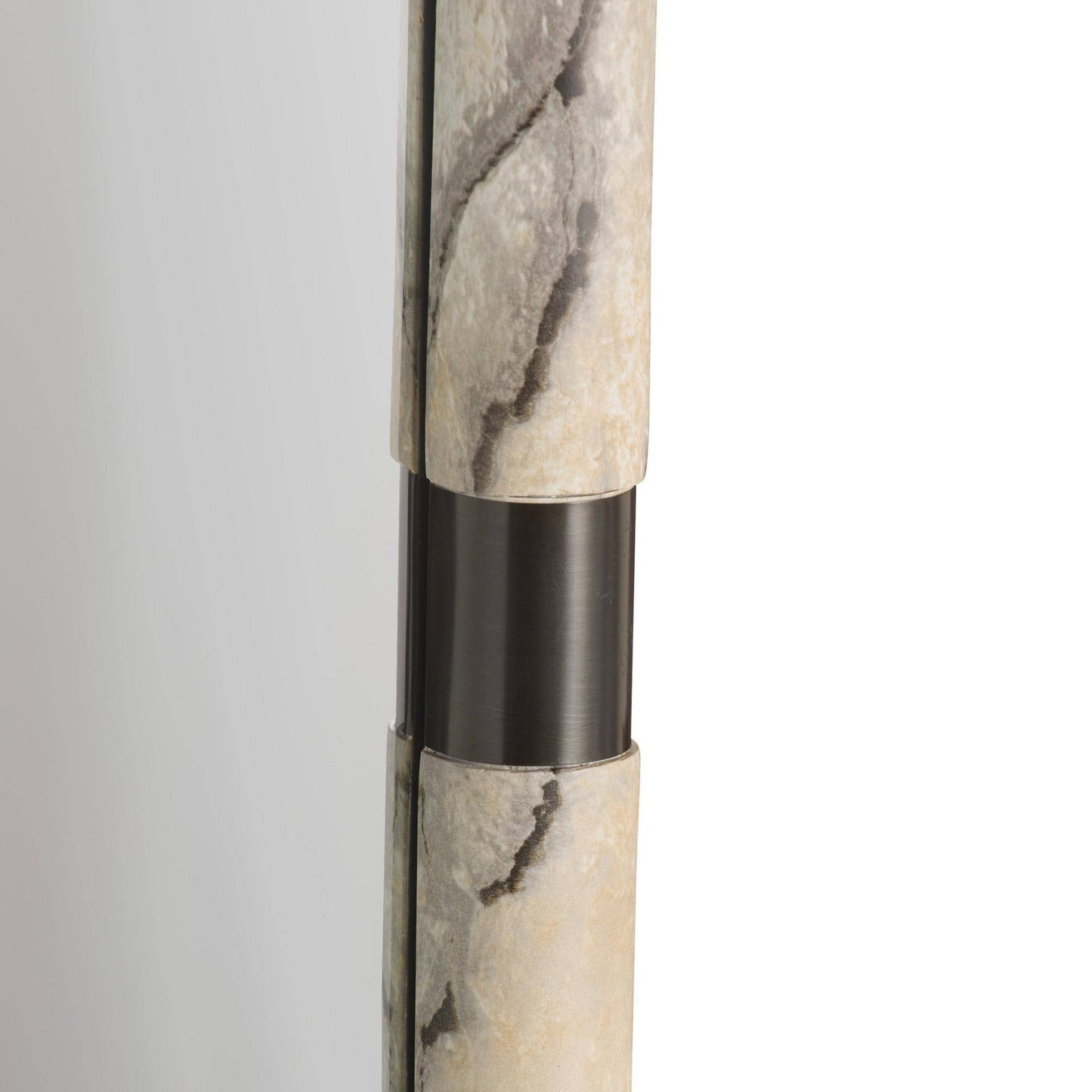 Marble-textured cylindrical object with a black accent on a light gray background