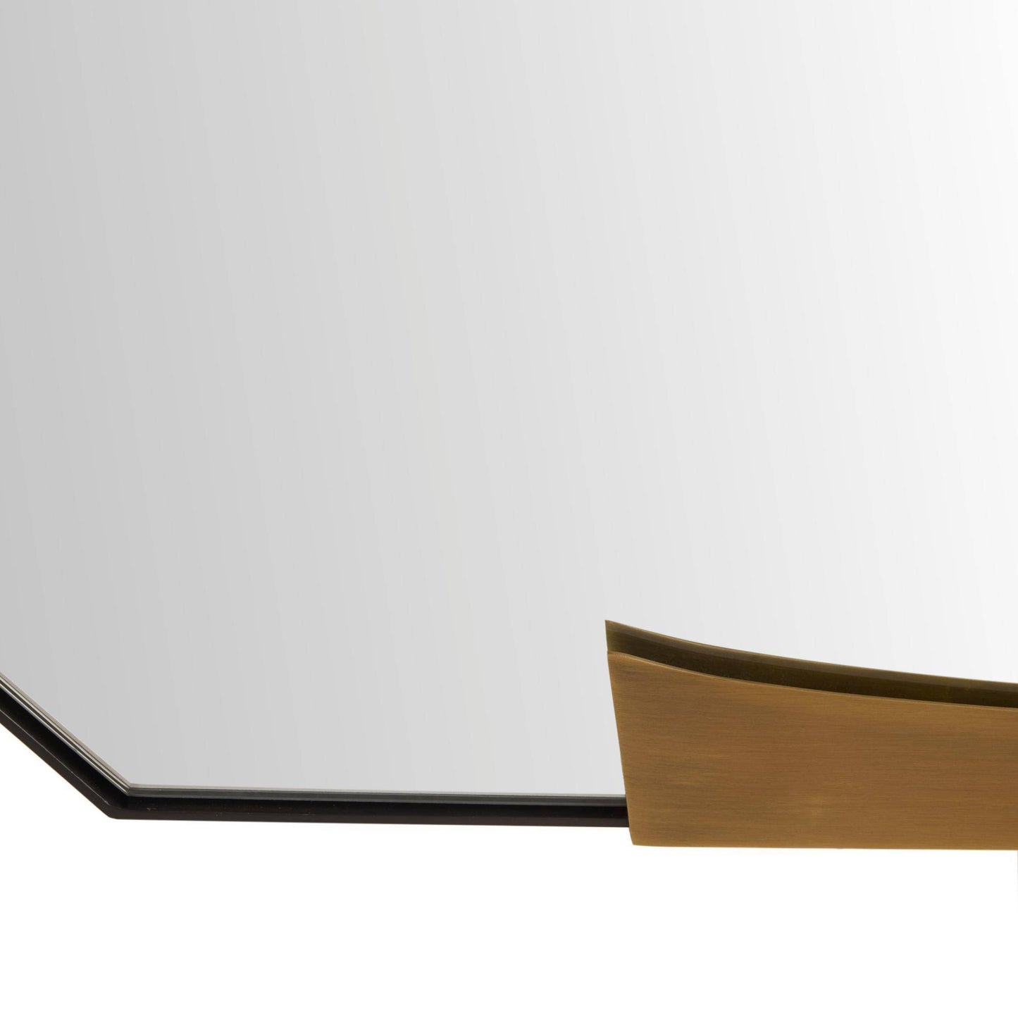 Close-up of a metallic object with a reflective surface on a white background