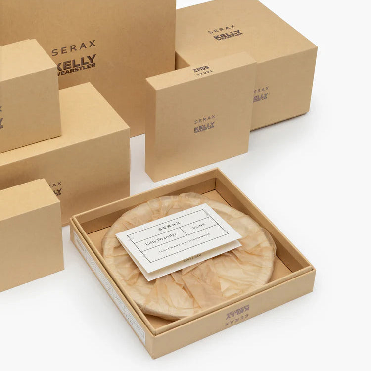 Serax hair styling product packaging on a white background