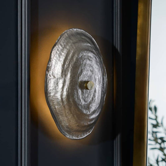 Textured Shine: Hand-Finished Silver Sconces