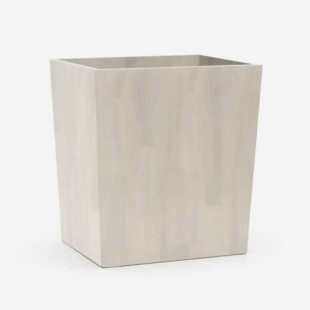 A faux horn white wastebasket, shown against a plain white background.