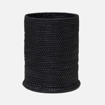A black woven basket with a cylindrical shape and a textured, braided pattern, shown against a plain light gray background.