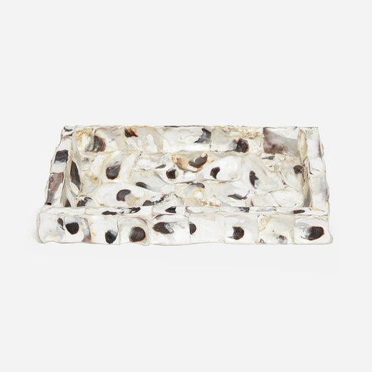 A rectangular resin tray with a textured, organic pattern of black, brown, and beige spots on a translucent white base, photographed on a light gray background.