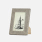 Striped photo frame with a printed image of a clock tower on a white background