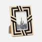 Decorative photo frame with geometric pattern on a white background