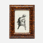 Framed illustration of a vintage diving helmet on a white background
