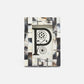 Decorative book with a stylized letter 'P' on a white background