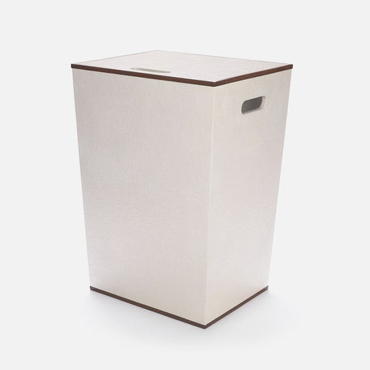 Beige laundry basket with brown rim on a white background