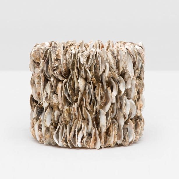 Textured cube-shaped object on a white background