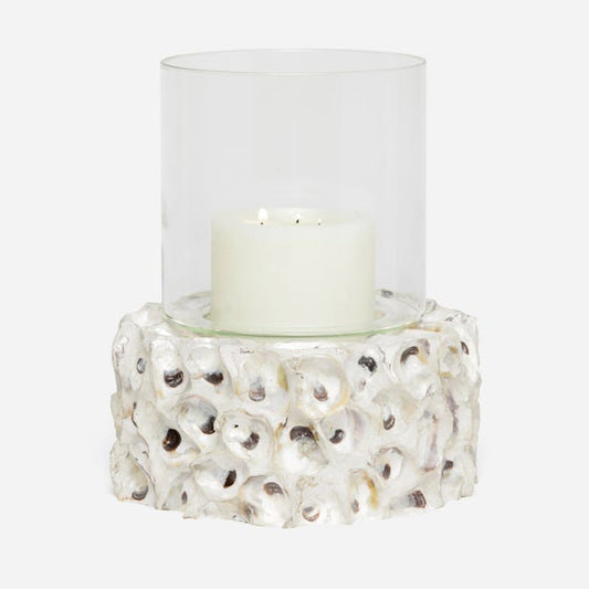 Candle holder with a candle inside on a white background