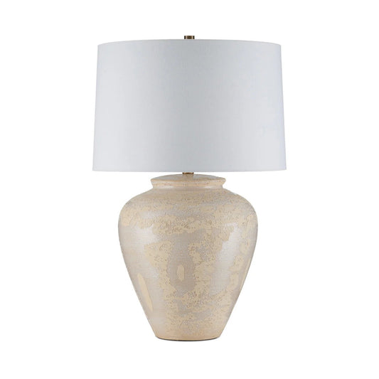 Table lamp with a textured beige base and white shade on a white background