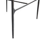 Close-up of a black metal chair leg on a white background