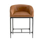 Brown leather bar stool with black metal frame on a white background