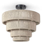 Ceiling light fixture with textured beige design on a white background