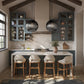 Modern kitchen with gray cabinets, marble countertop, and pendant lights.