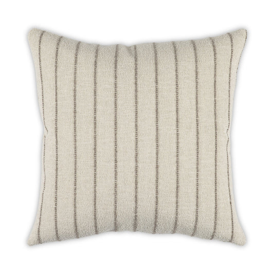 Striped pillow with a neutral color scheme on a white background