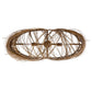 Decorative wreath made of intertwined branches on a white background