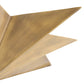 Gold metallic sculpture with geometric design on a white background