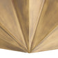 Close-up of a gold metallic surface with a textured pattern