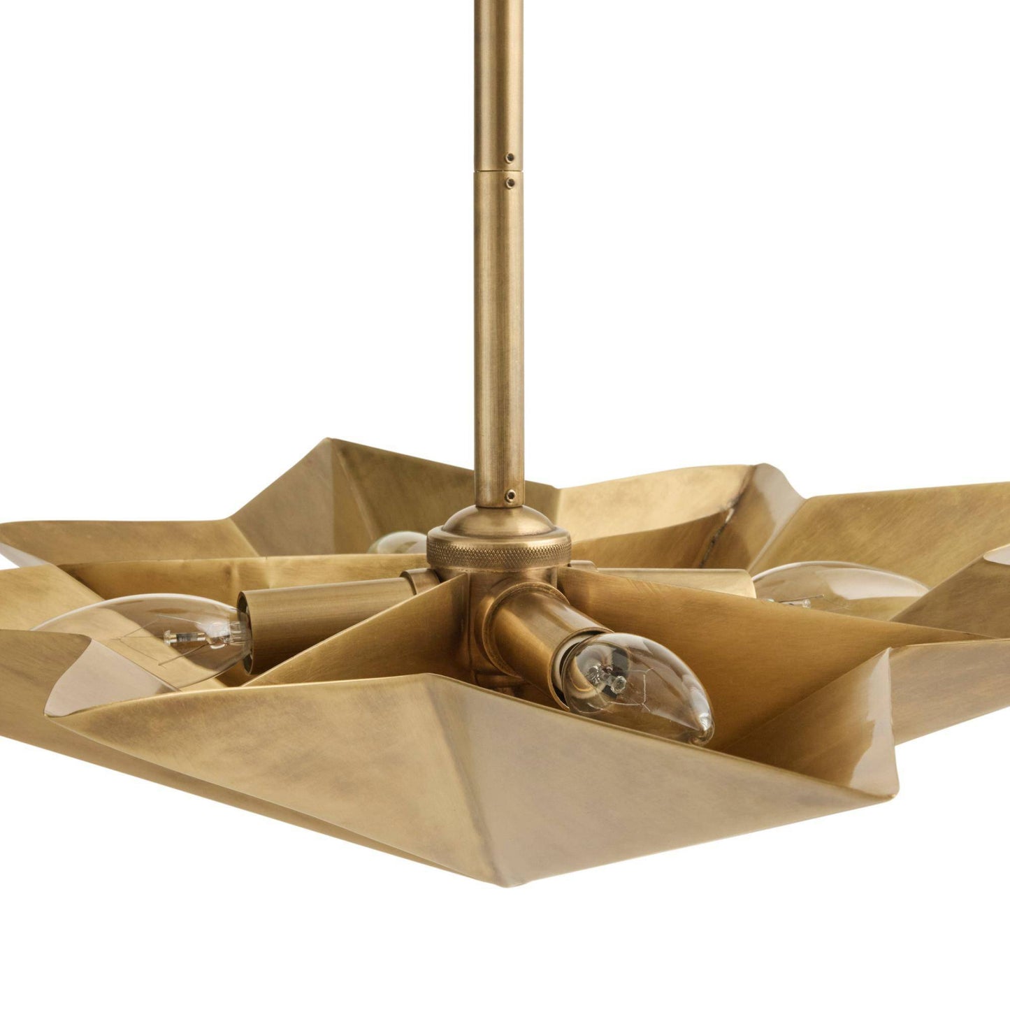A close-up of a modern brass ceiling light fixture with a central vertical rod and multiple angular metal arms holding clear glass bulbs, shown against a plain white background.