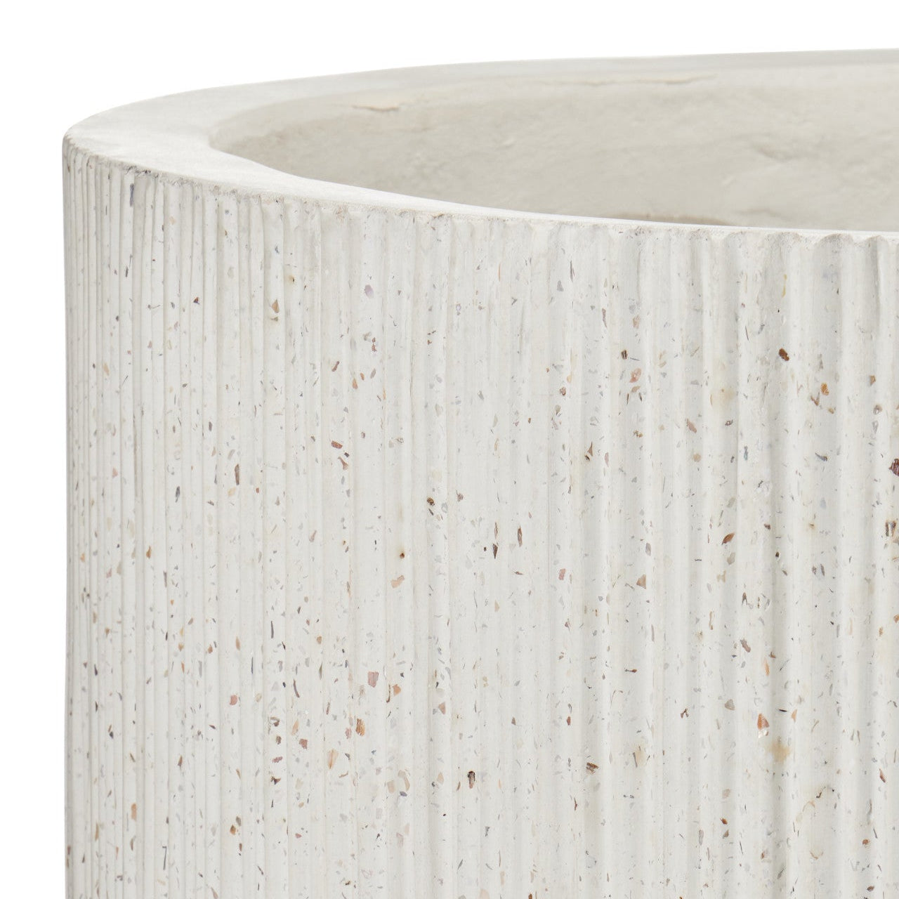 Close-up of a textured white ceramic planter on a white background