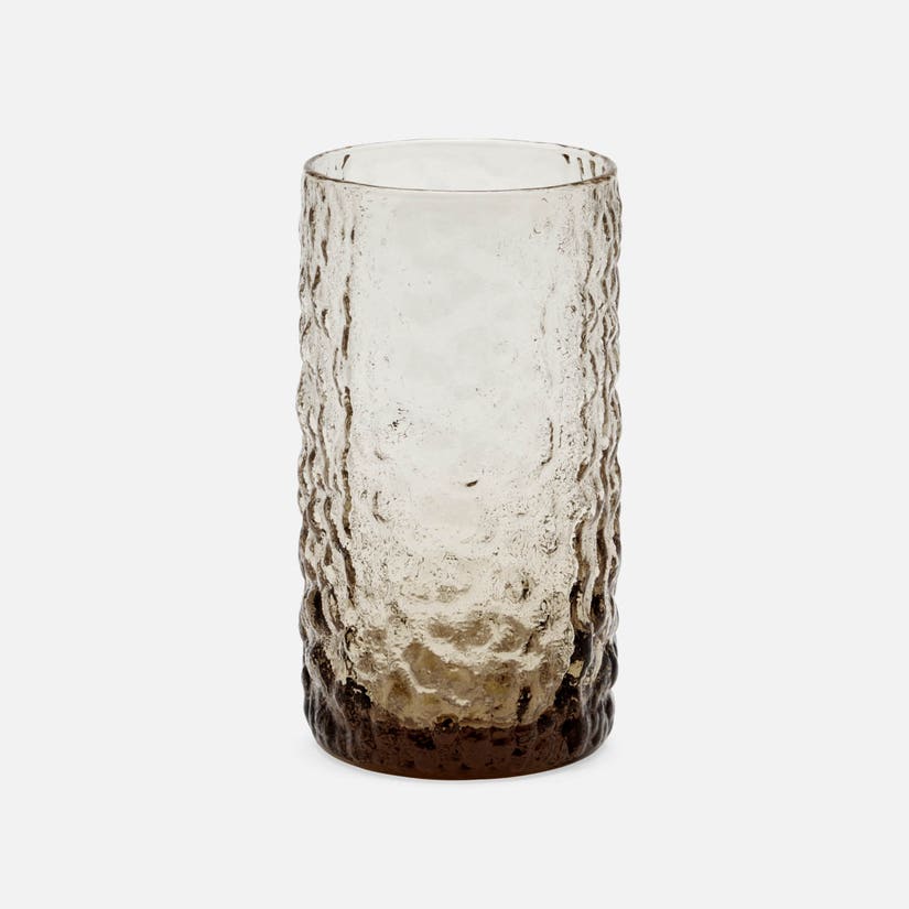 Textured glass vase on a white background