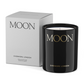 Black candle with 'MOON' branding and packaging on a white background