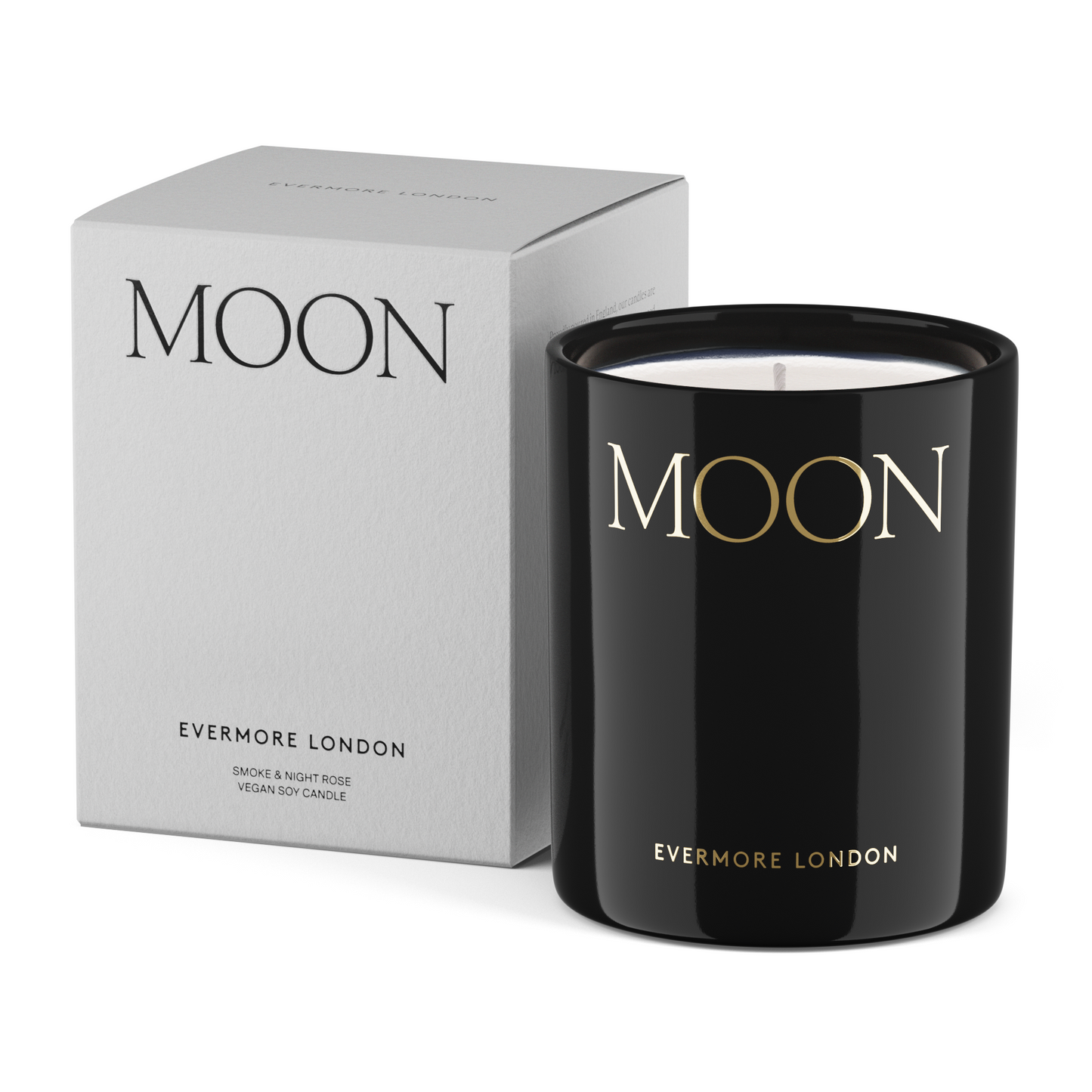 Black candle with 'MOON' branding and packaging on a white background