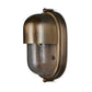Bronze outdoor wall light fixture on a white background