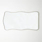 Rectangular mirror with a thin black frame on a white background