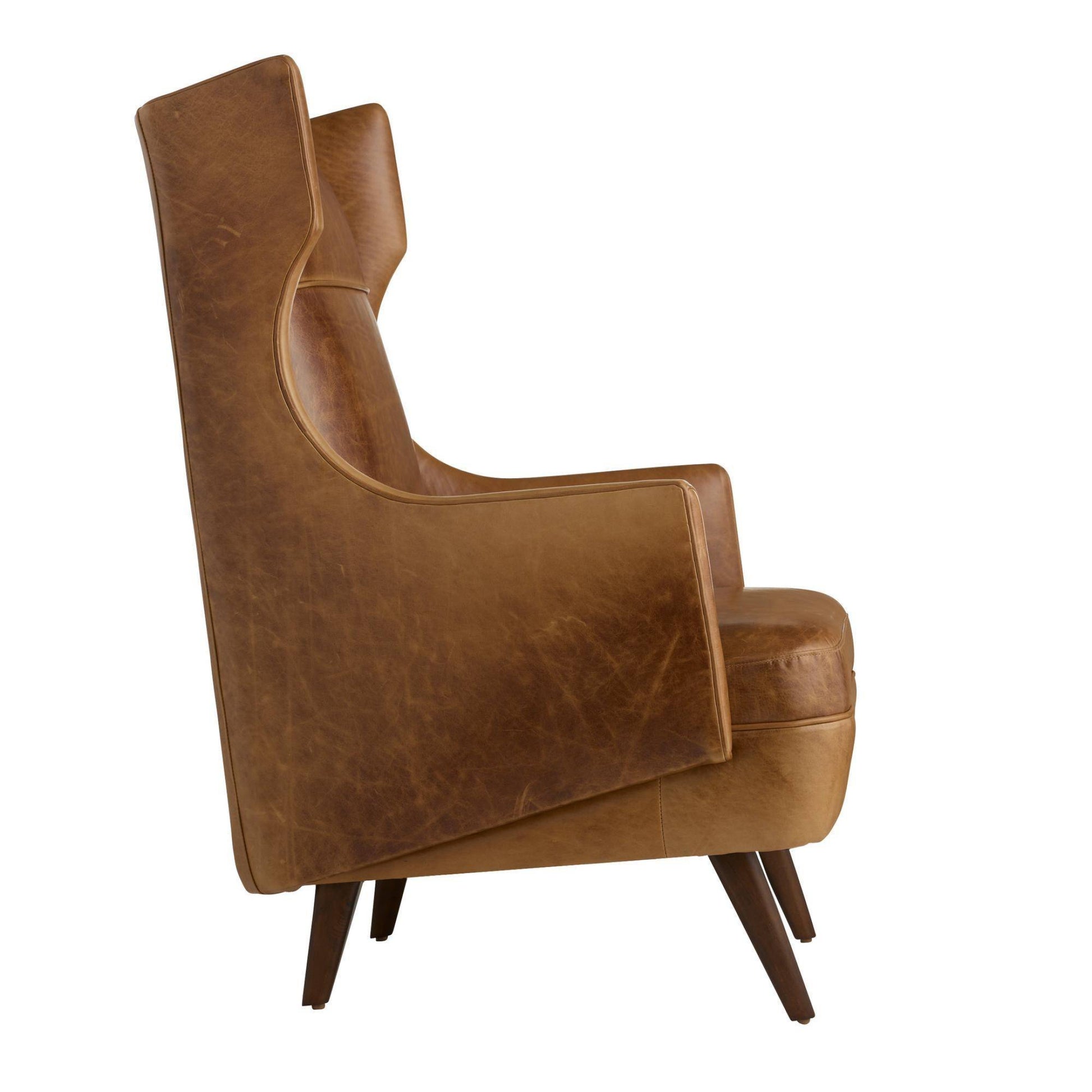 Brown leather armchair on a white background