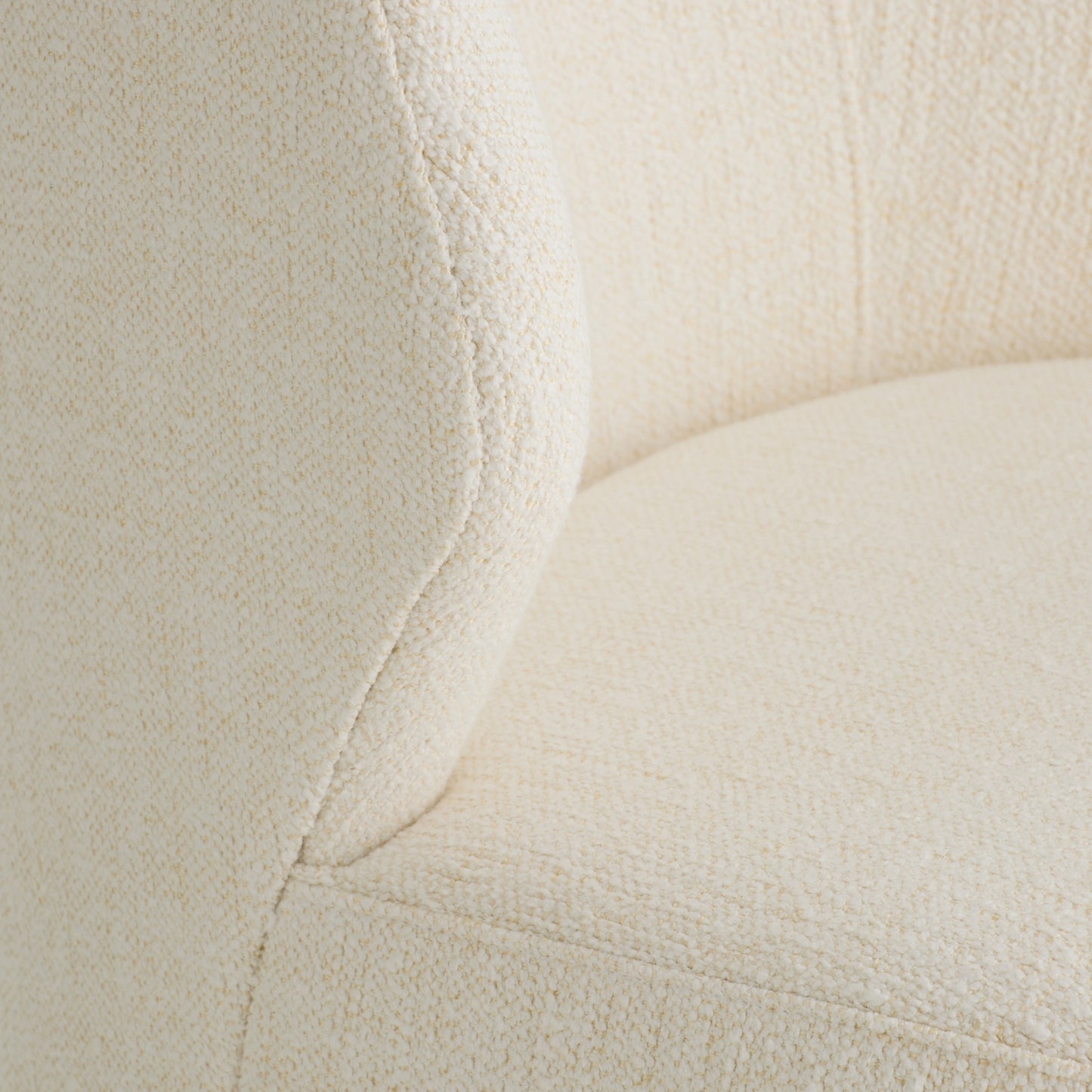 Close-up of a textured beige fabric surface