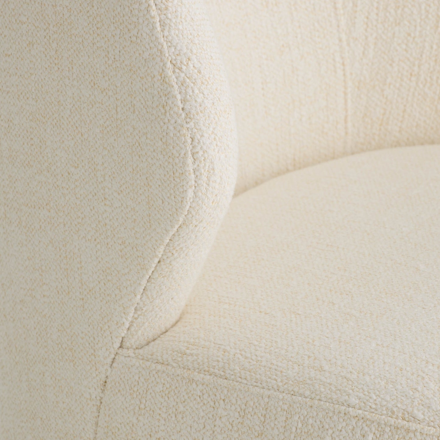 Close-up of a textured beige fabric surface