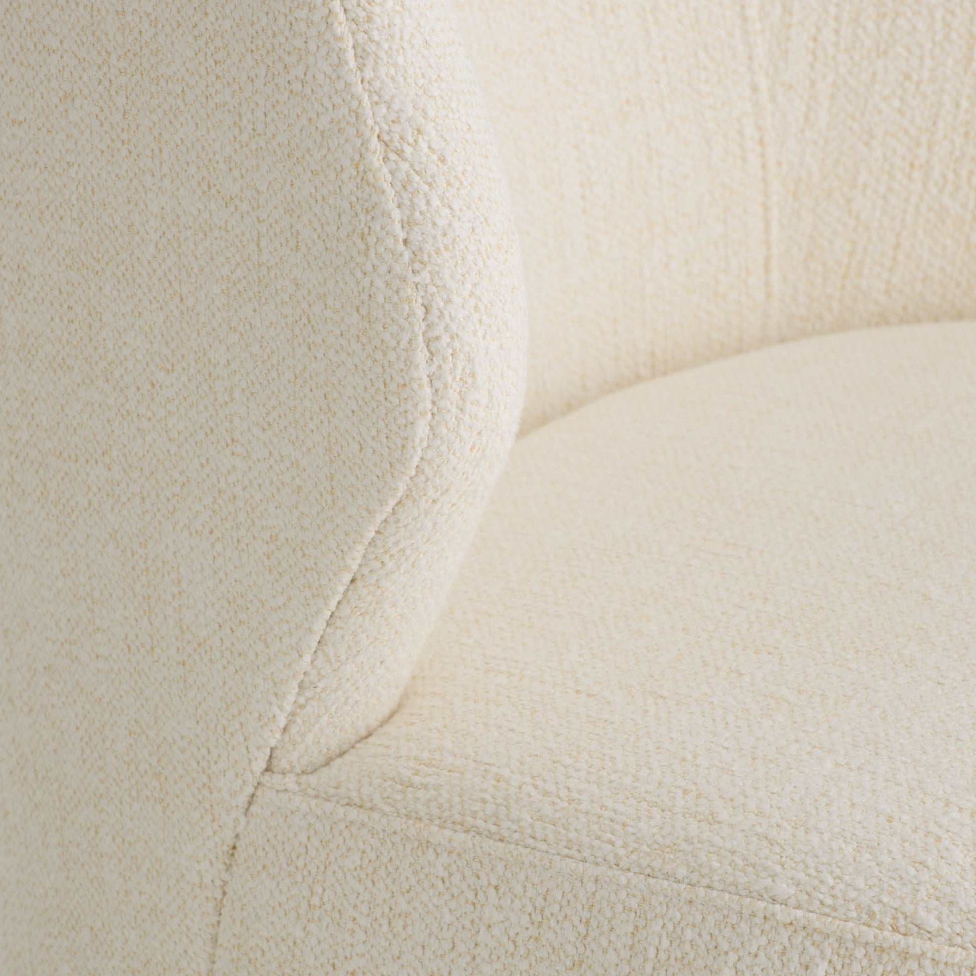 Close-up of a textured beige fabric surface